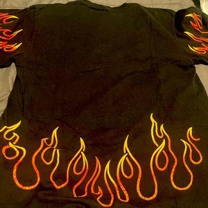 Gently worn “Broken Promises “ black T-Shirt. Size Large.